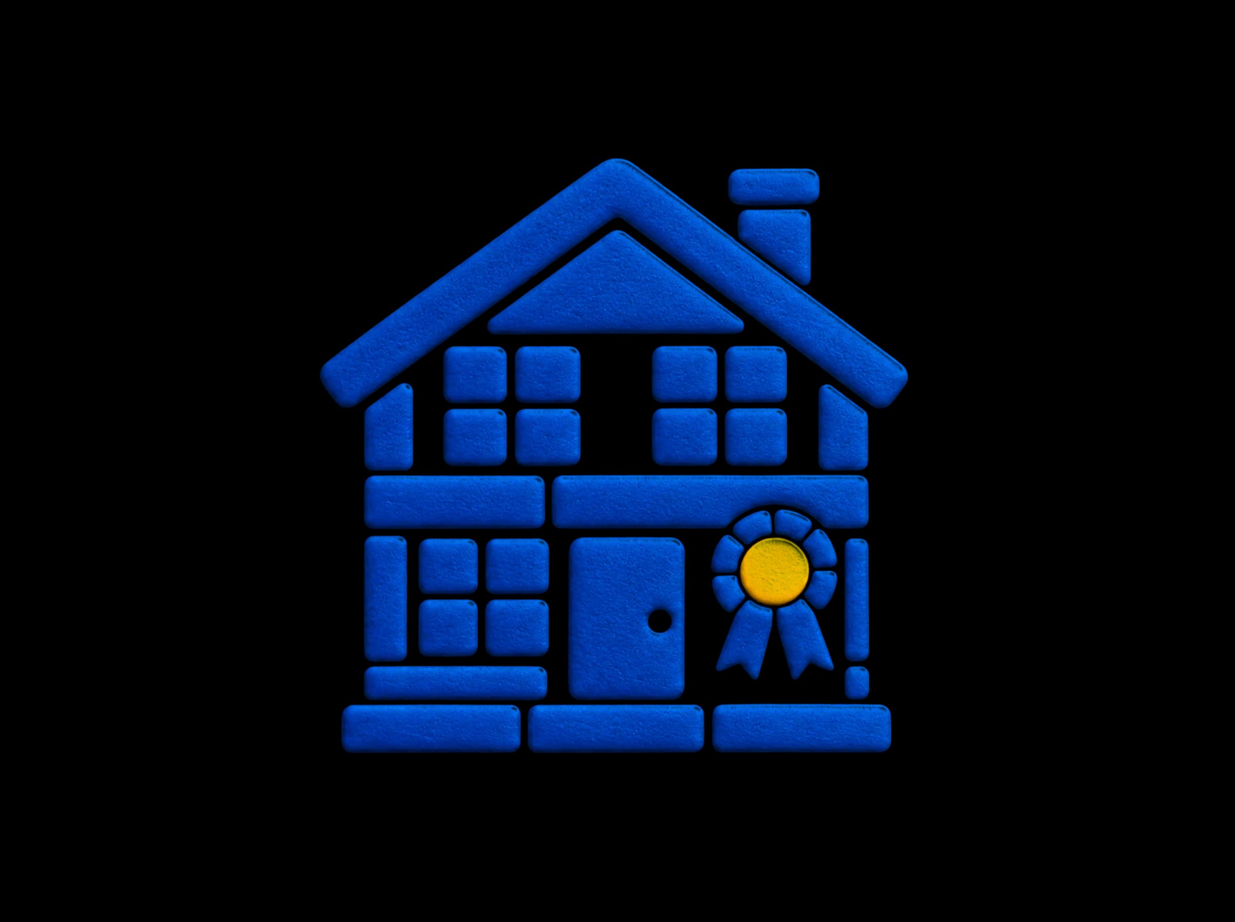 Pressed-paper illustration: a finished two-story house with an award ribbon by the front door.
